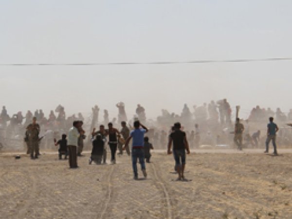Kobanî Halkı İki Ateş Arasında 