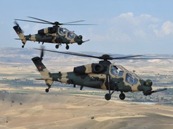 Operasyondan dönen helikopterlere ateş açıldı